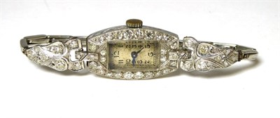 Lot 407 - A diamond cocktail watch, silvered Arabil dial, with a lozenge shaped case set throughout with...