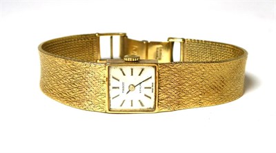 Lot 409 - A lady's 9ct gold wristwatch, signed Tissot