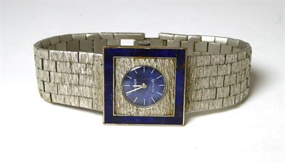 Lot 410 - A lady's wristwatch, lapis set bezel signed Tissot