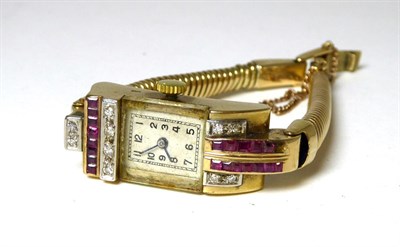 Lot 411 - A lady's 9ct gold ruby and diamond set wristwatch