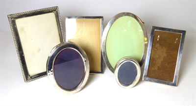 Lot 413 - Six rectangular and oval silver photograph frames, the largest 15cm high