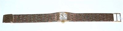 Lot 419 - A 9 carat three colour gold ";Chateau"; lady's wristwatch