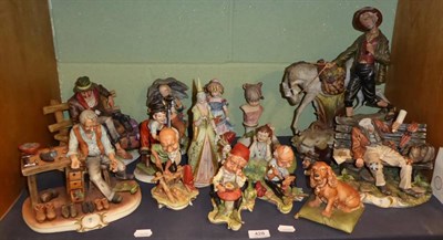 Lot 428 - A group of Capodimonte, including Pinocchio and Shoe Mender