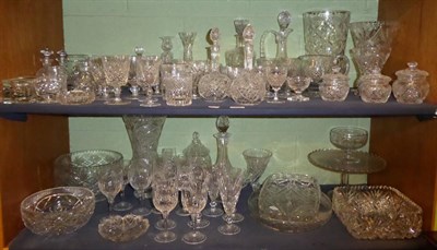 Lot 435 - A large quantity of good quality cut glass including table glasses, vases, bowls and decanters (two
