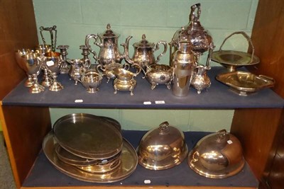 Lot 436 - A group of assorted silver plated items to include tea services; goblets; twin handled trays;...