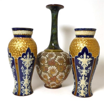 Lot 443 - A pair of Royal Doulton blue and gilt decorated baluster vases and a large Doulton Lambeth Slater's