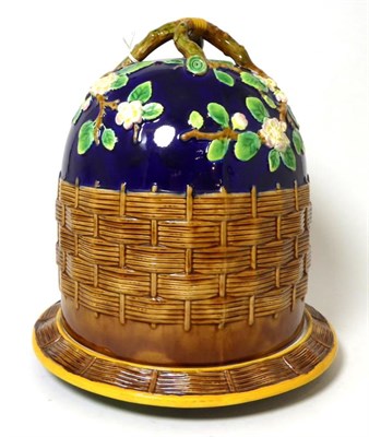 Lot 470 - A Victorian George Jones Majolica cheese dome on stand, with applied branch handle, leaf and floral