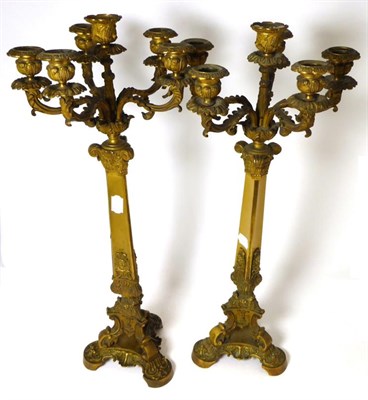 Lot 471 - Pair of 20th century gilt metal six light candelabra