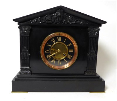 Lot 472 - A black slate striking mantel clock, retailed by J & W Mitchell, Glasgow