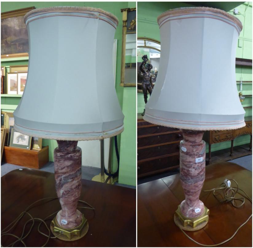 Lot 487 - A pair of large gilt metal mounted marble table lamps, 57cm high excluding fitting