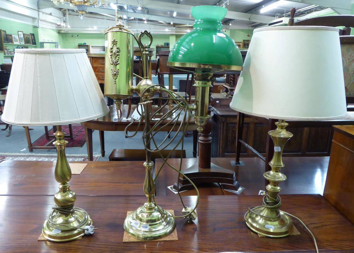 Lot 488 - Three various brass table lamps, one in the form of an oil lamp