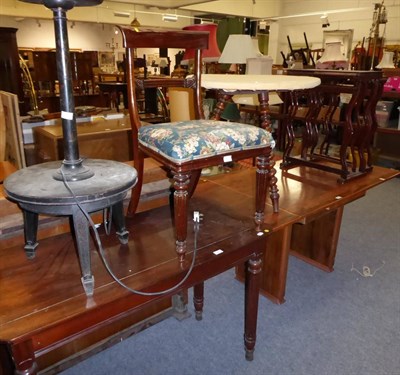 Lot 1023 - An Art Deco walnut drawer leaf table; a Victorian table with three boldly turned legs; a...