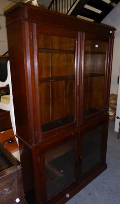 Lot 1037 - An oak glazed bookcase