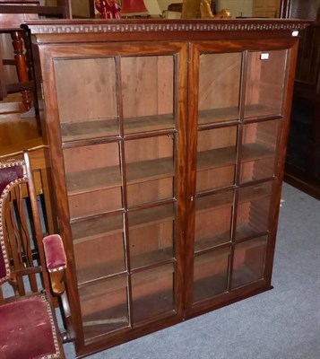 Lot 1041 - A glazed bookcase, probably formerly the upper section of a larger bookcase