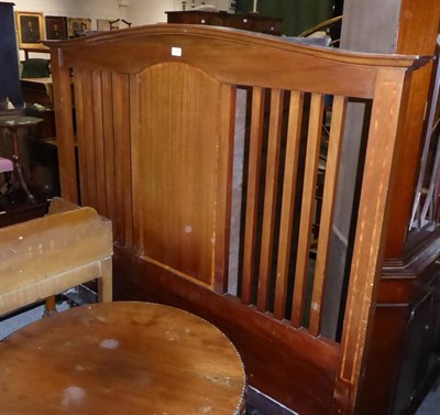 Lot 1042 - An early 20th century cross banded mahogany bed frame