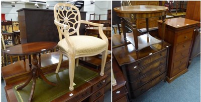 Lot 1055 - A group of reproduction furniture comprising two tables, an open armchair and two chests of drawers