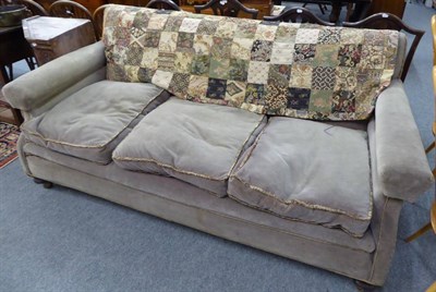 Lot 1062 - An early 20th century three seat sofa of generous proportions