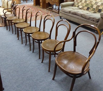 Lot 1065 - A set of six bentwood dining chairs and a pair of similar armchairs, all with Thonet labels to...