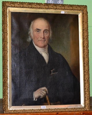 Lot 1139 - English School, 19th Century, Portrait of a gentleman, half length wearing a black coat and holding