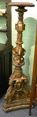 Lot 1144 - A large carved giltwood torchere, 162cm high