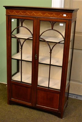 Lot 1149 - An Edwardian display cabinet