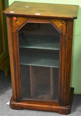 Lot 1152 - A Victorian inlaid walnut music cabinet