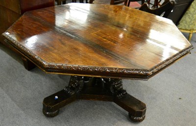 Lot 1183 - An impressive Victorian carved oak octagonal shape centre table, circa 1850, with a leaf carved...