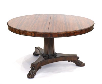 Lot 1187 - A William IV rosewood circular dining table, 2nd quarter 19th century, raised on a column...