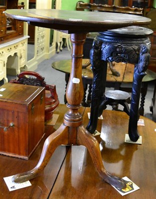 Lot 1218 - A 19th century oak tripod table