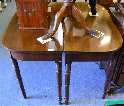 Lot 1219 - A pair of 19th century mahogany D end tables (two ends of a dining table)