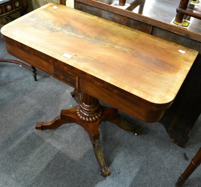 Lot 1230 - A William IV mahogany foldover games table