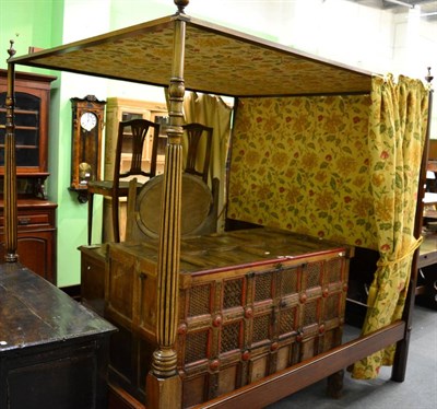 Lot 1248 - A mahogany tester bed with fluted front supports and urn shaped finials