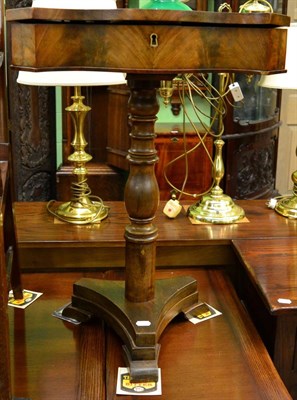 Lot 1250 - A 19th century mahogany work table with hinged top