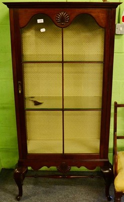 Lot 1268 - A glass display cabinet with single door on cabriole supports