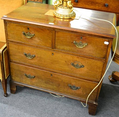 Lot 1277 - A mahogany three height chest of drawers