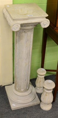 Lot 1287 - A carved stone plinth of column form, together with two small part columns