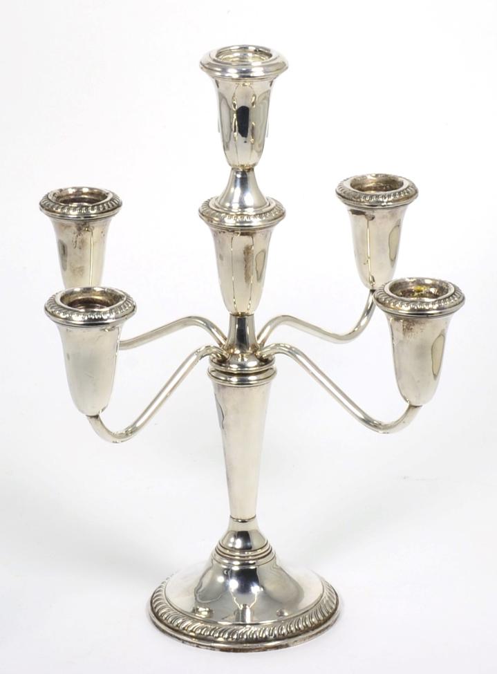 Lot 12 - An American sterling five-light candelabra, stamped Empire Sterling, bearing Gump's label to...