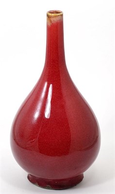 Lot 37 - A Chinese sang de boeuf bottle vase, bearing four character marks