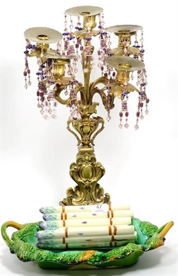Lot 47 - A French Majolica asparagus dish and a 19th century gilt bronze five light candelabra