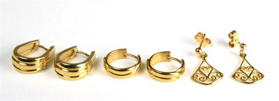 Lot 53 - Three pairs of 9 carat gold earrings, comprising two pairs of hoop earrings and a pair of drop...