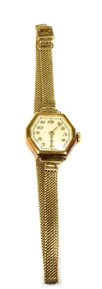 Lot 56 - A lady's 18 carat wristwatch and bracelet, circa 1930s, with octagonal case