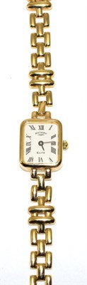 Lot 63 - A lady's 9 carat gold Rotary Elite wristwatch, on a 9 carat gold Rotary bracelet strap