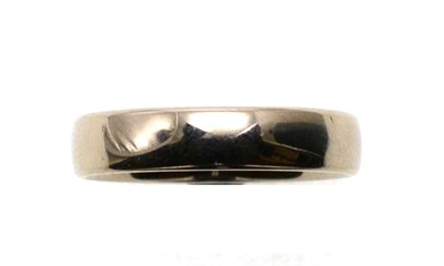 Lot 64 - An 18 carat white gold band ring, finger size U