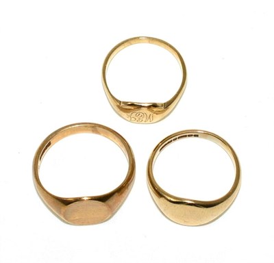 Lot 77 - Two 9 carat gold signet rings and another signet ring, finger size P1/2, L and J1/2 (3)