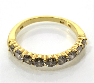 Lot 98 - A diamond half hoop ring, nine round brilliant cut diamonds in claw settings, total estimated...