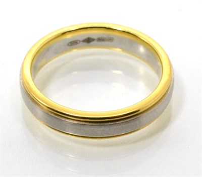 Lot 99 - A platinum and 18 carat gold band ring, an inner brushed polished platinum band between two...