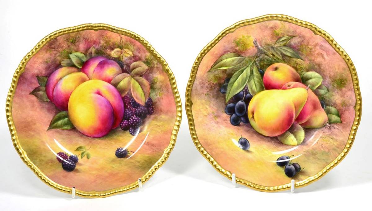 Lot 129 - Two Coalport fruit painted plates,painted by A R Rudd