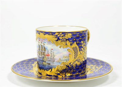 Lot 135 - Nowaci, a painted cup and saucer decorated with ships, signed
