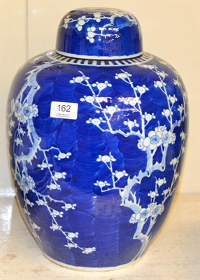 Lot 162 - A Chinese blue and white prunus and cracked ice ginger jar and cover