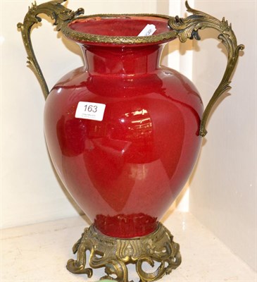 Lot 163 - Sang de boeuf vase with gilt metal mounts (damaged)